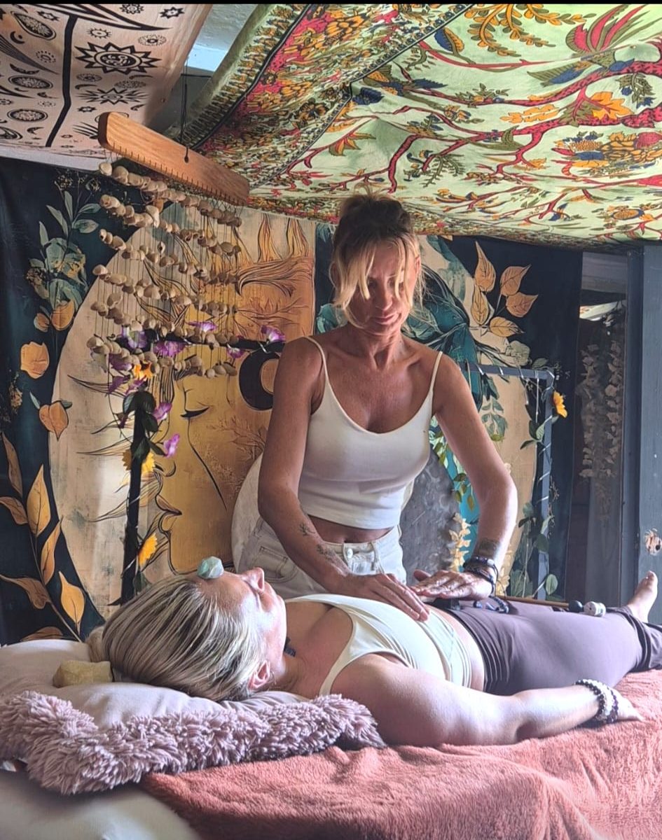 Claire giving a Reiki treatment at The Zen Den
